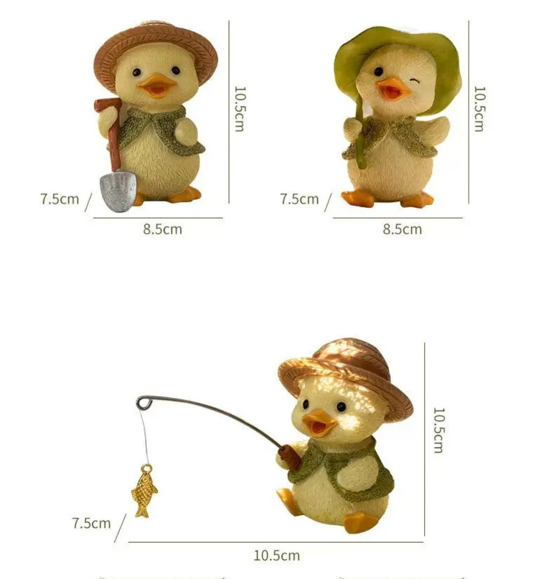 charming yellow duck figurines: cute office desk & garden decor