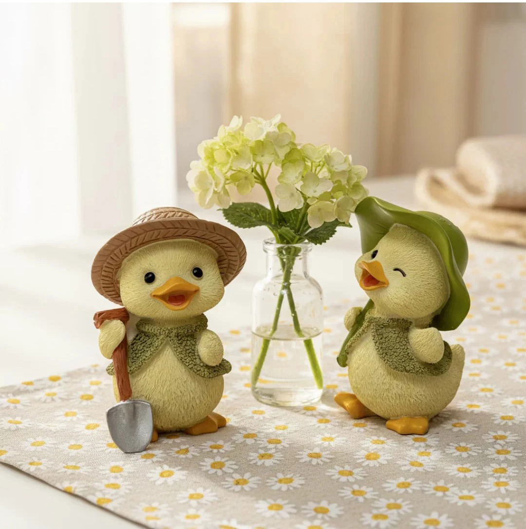charming yellow duck figurines: cute office desk & garden decor