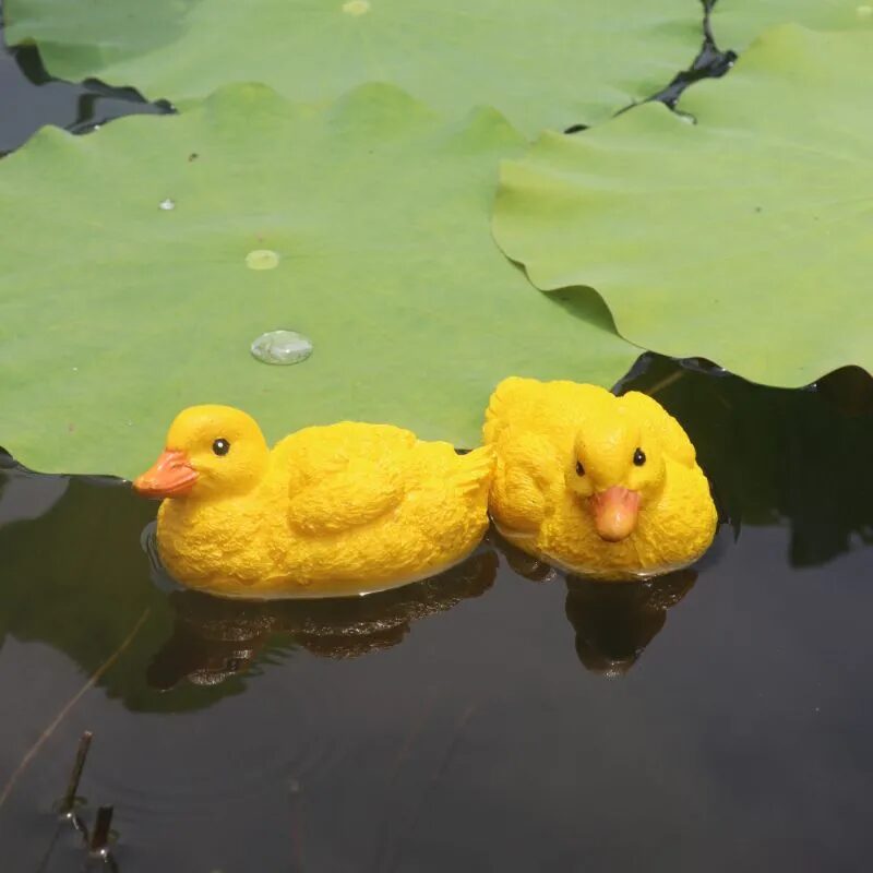 adorable floating yellow duck resin ornaments for garden ponds & fountains