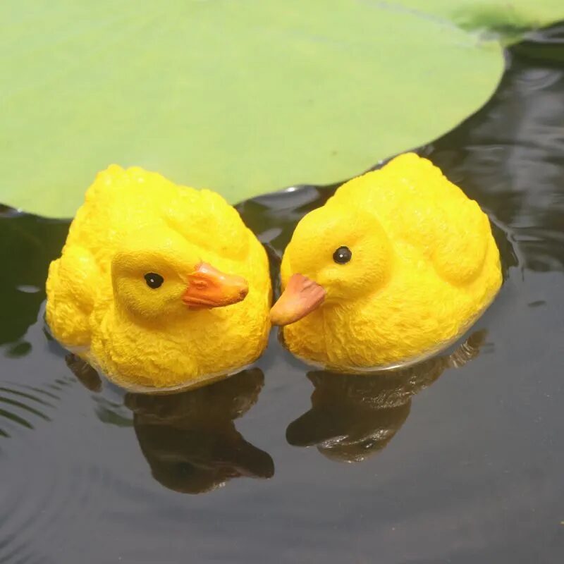 adorable floating yellow duck resin ornaments for garden ponds & fountains