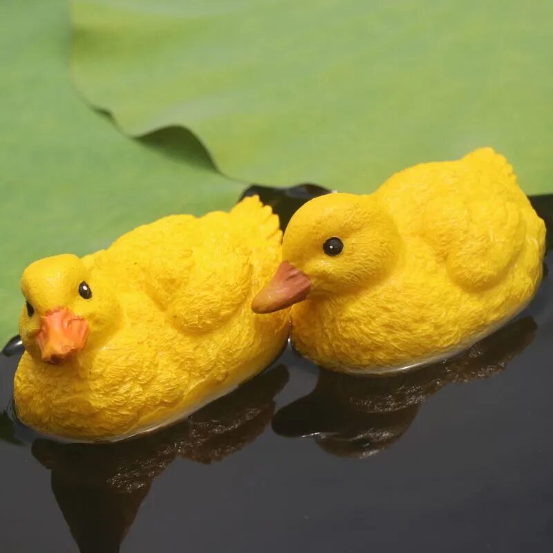 adorable floating yellow duck resin ornaments for garden ponds & fountains