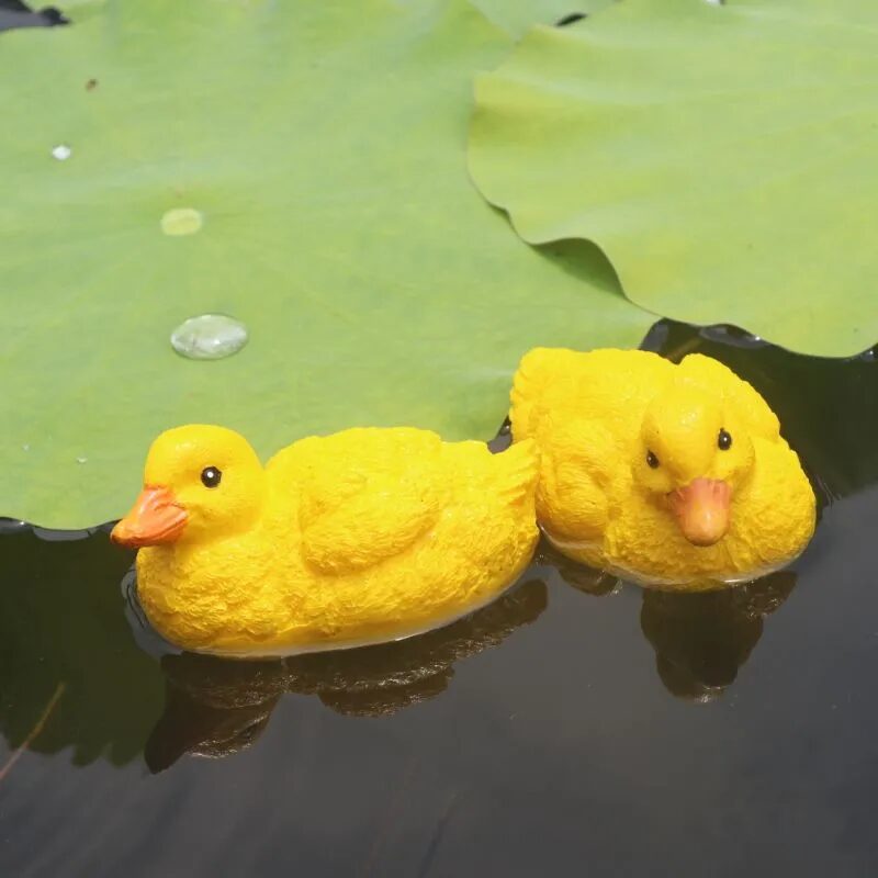adorable floating yellow duck resin ornaments for garden ponds & fountains