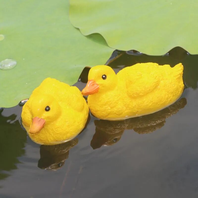 adorable floating yellow duck resin ornaments for garden ponds & fountains