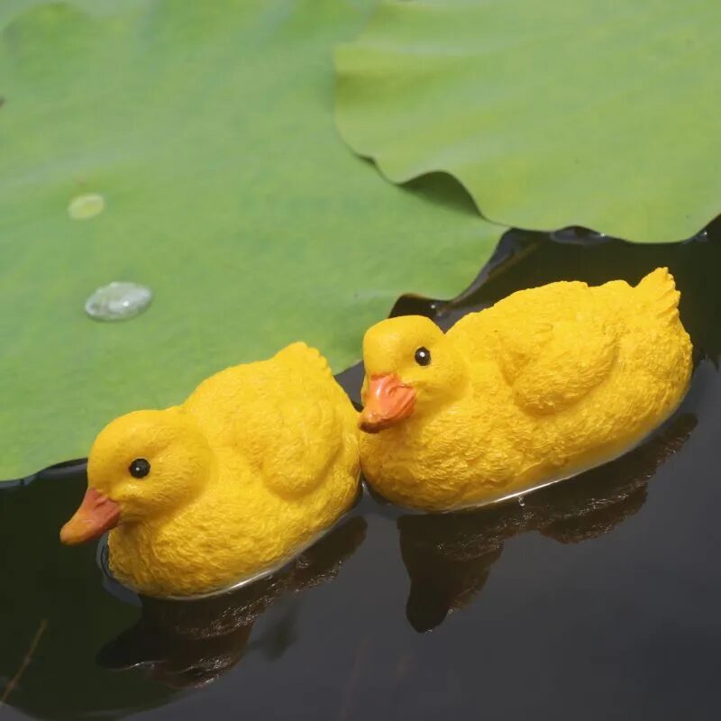 adorable floating yellow duck resin ornaments for garden ponds & fountains