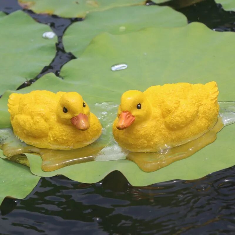 adorable floating yellow duck resin ornaments for garden ponds & fountains