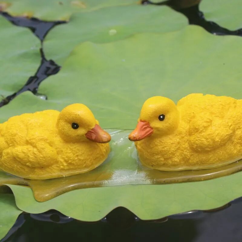 adorable floating yellow duck resin ornaments for garden ponds & fountains