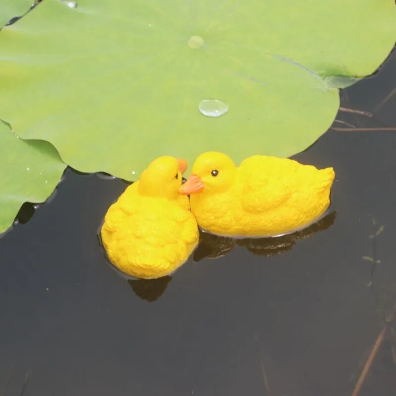 adorable floating yellow duck resin ornaments for garden ponds & fountains