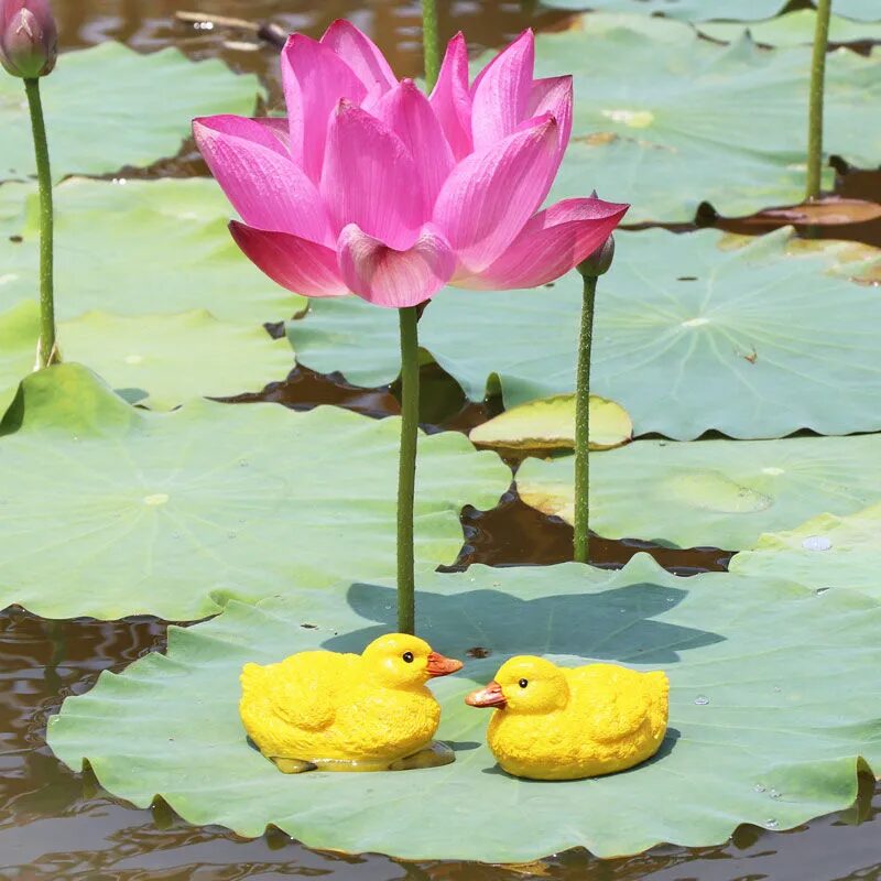 adorable floating yellow duck resin ornaments for garden ponds & fountains