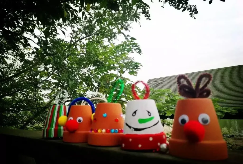 diy terracotta pot christmas ornaments: easy holiday crafts