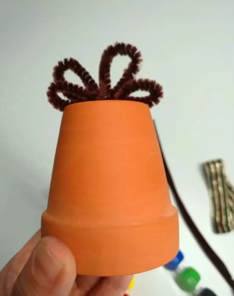 diy terracotta pot christmas ornaments: easy holiday crafts