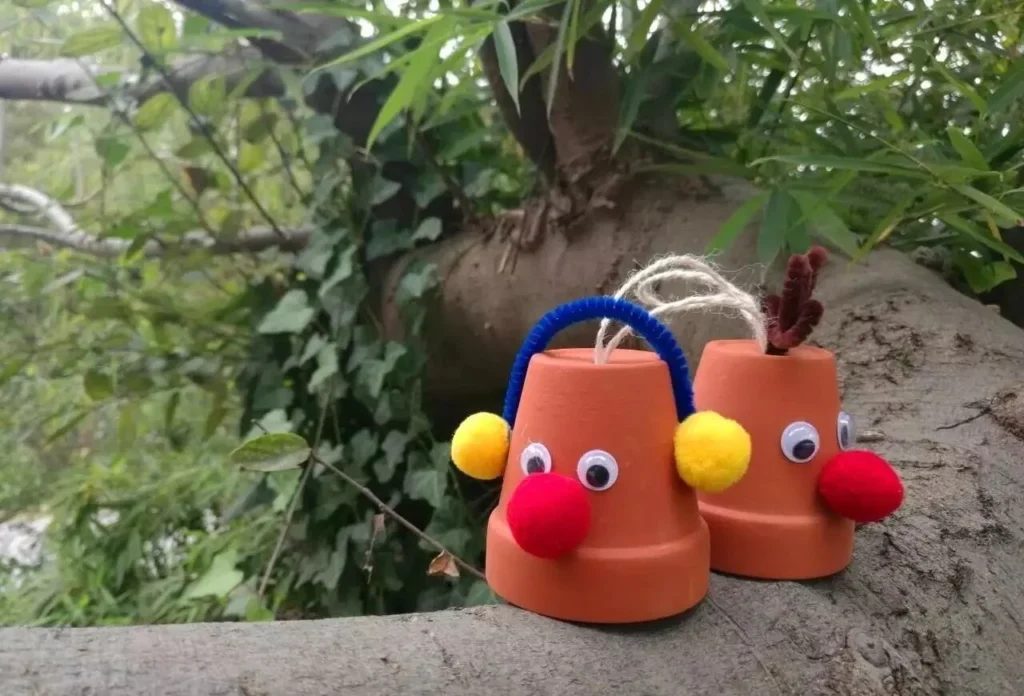 diy terracotta pot christmas ornaments: easy holiday crafts