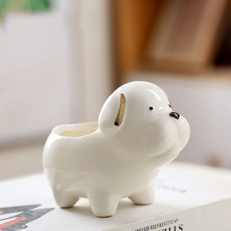 White ceramic dog planter for small indoor plants
