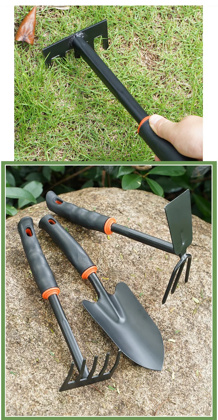 Garden hand rake in grass and tool set on rock