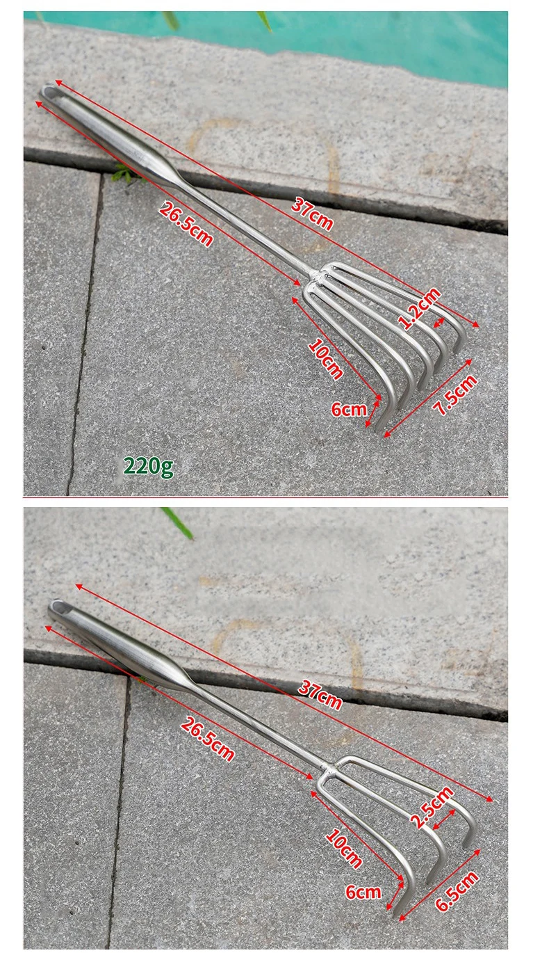 Five tine stainless steel garden rake on a stone background